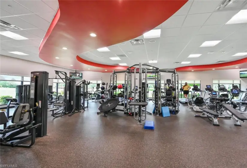 Exercise room with a raised ceiling and a drop ceiling