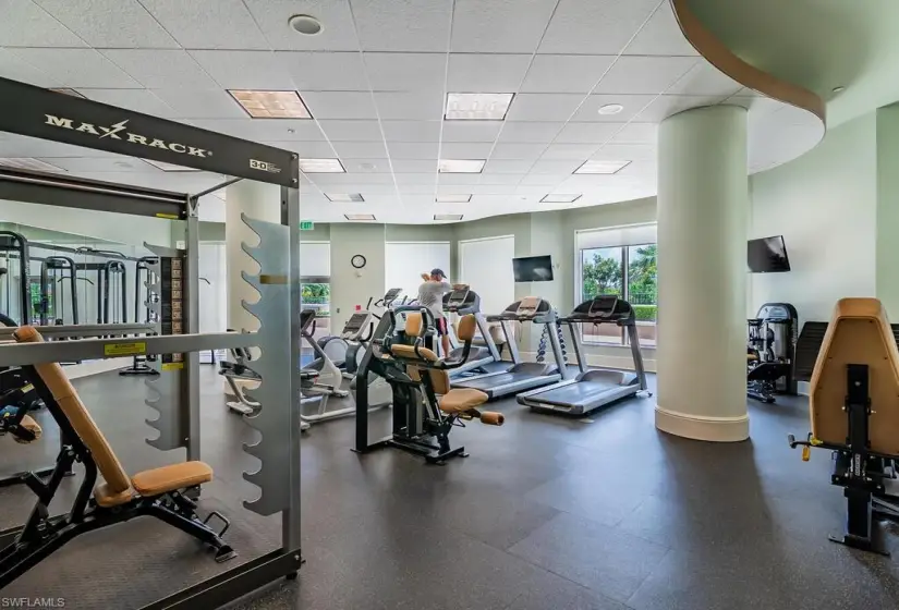 Exercise room featuring a drop ceiling